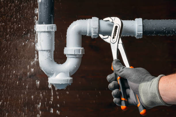 Professional Drain Cleaning technician working in Elkton, FL